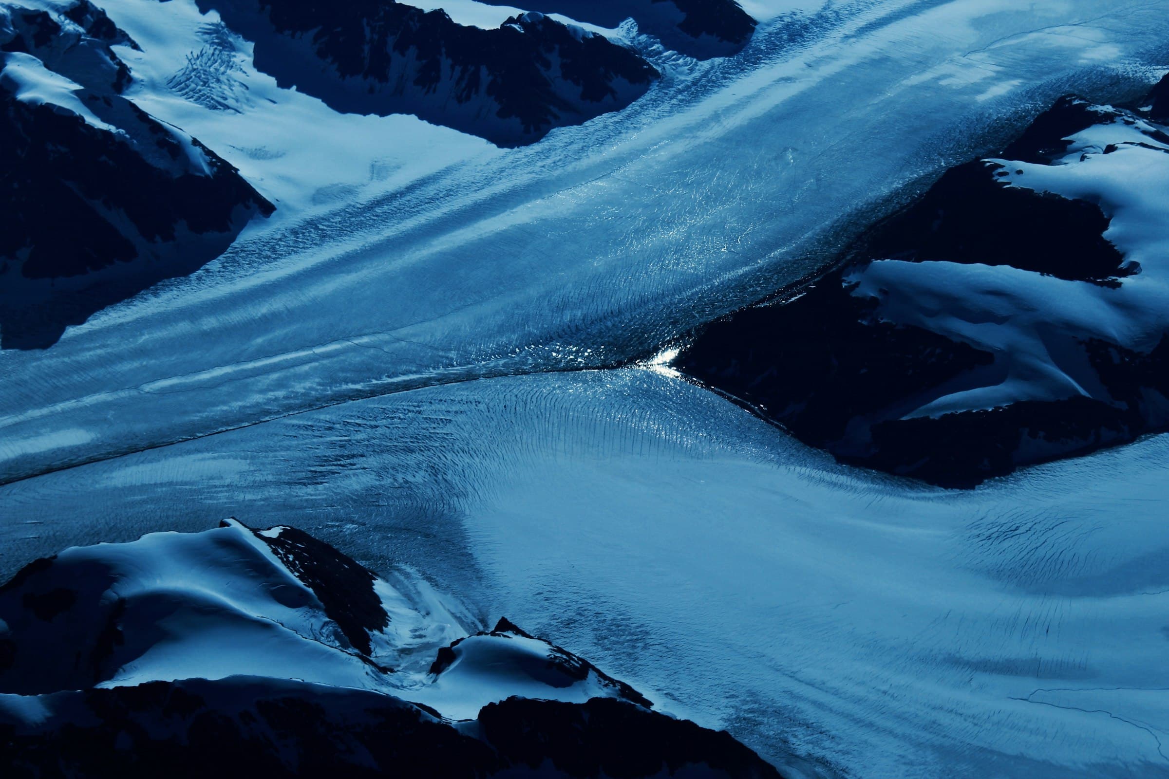 A glacier under a clear sky